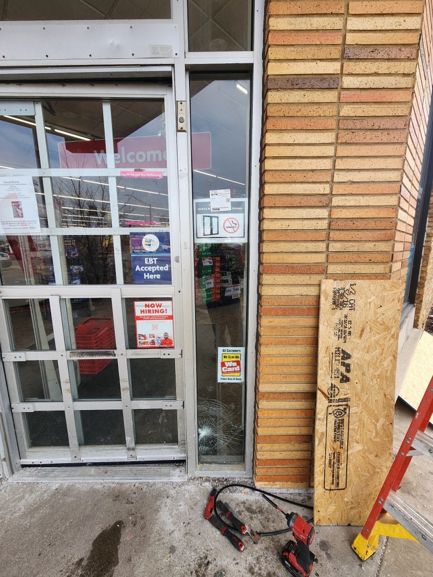 Before: Damaged commercial drywall and flooring